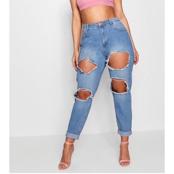 jeans with rips in the front and back